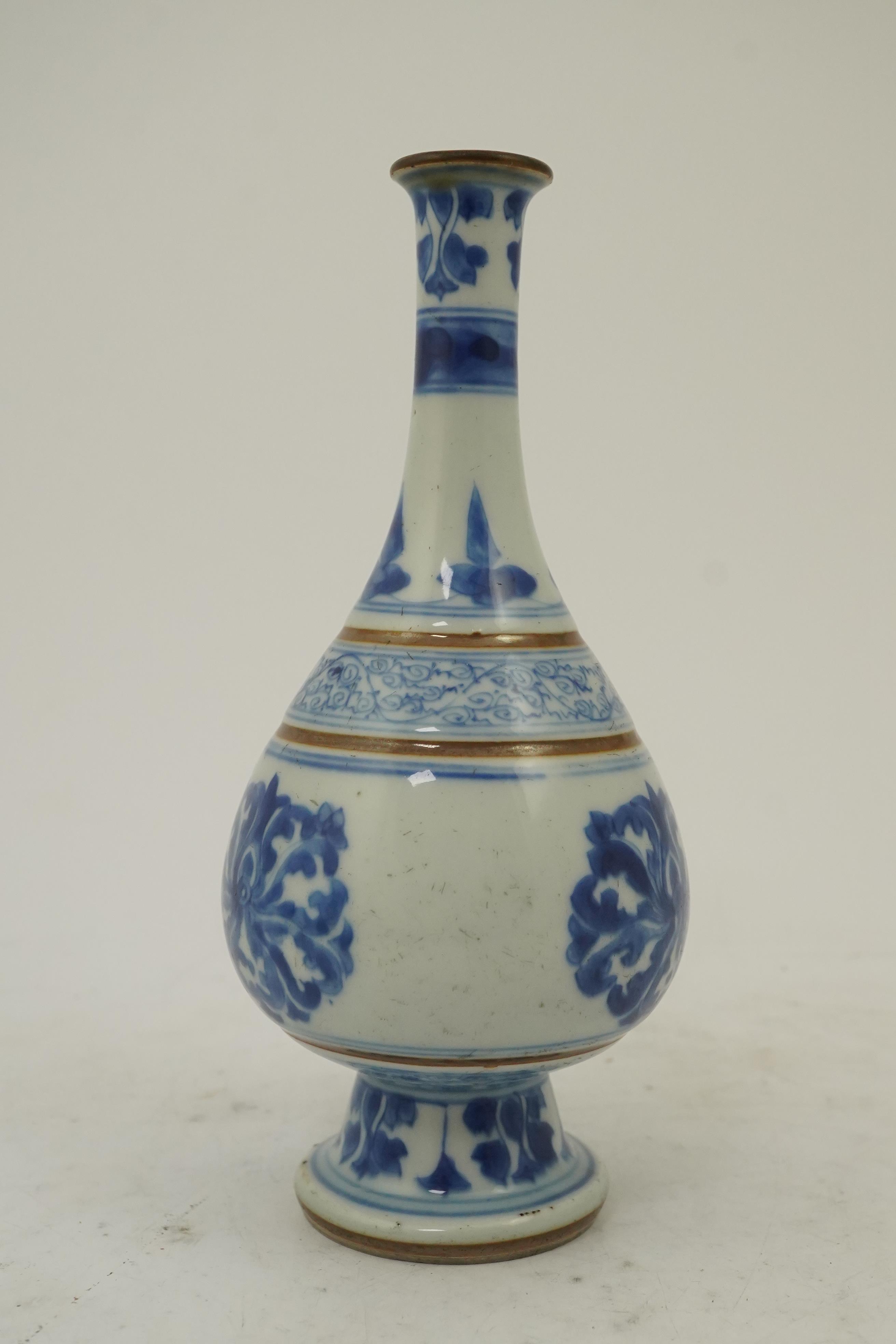 A Chinese blue and white ‘lotus’ bottle vase, Kangxi period